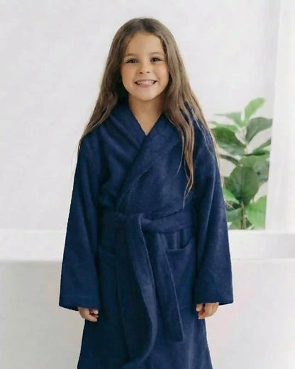 kids bathrobe blue A girl smiling to wear a kids bathrobe